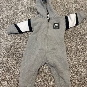 Nike Grey Hooded Baby One-Piece with Black & White Sleeve Stripes